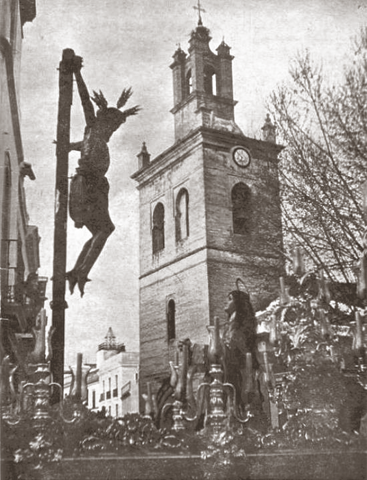 El Cristo del Buen Fin, con la Magdalena arrodillada a los pies del Crucificado, en la portada del Programa Oficial anunciador de la Semana Santa de 1966.